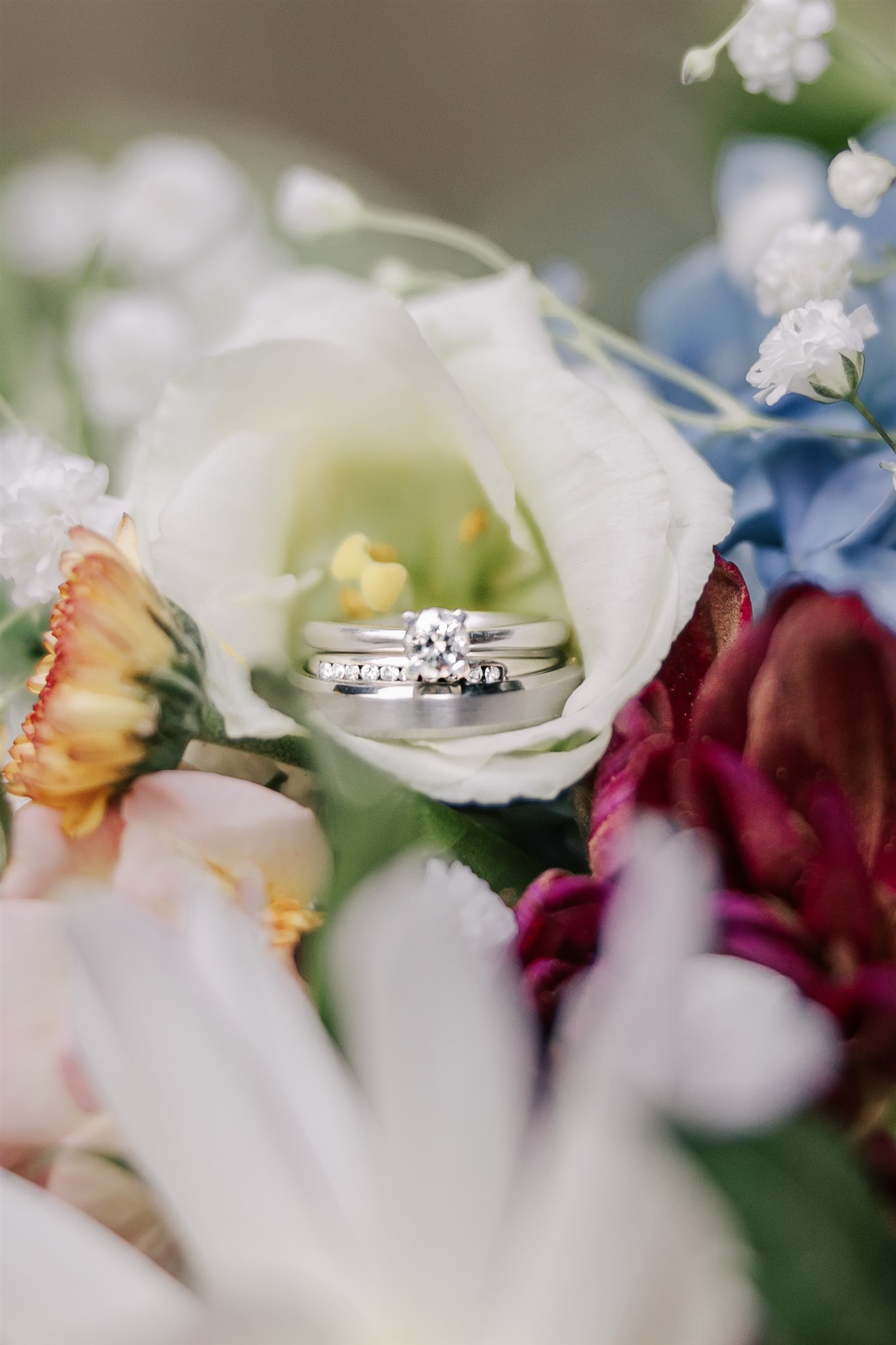 wedding rings in a bouquet of flowers