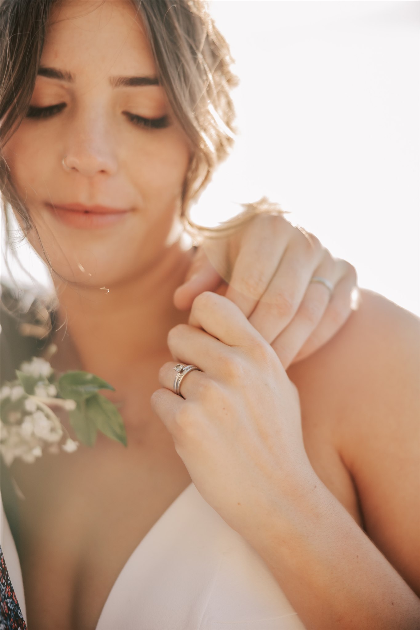 bride holding her groom's hand at their Hatley Castle Wedding