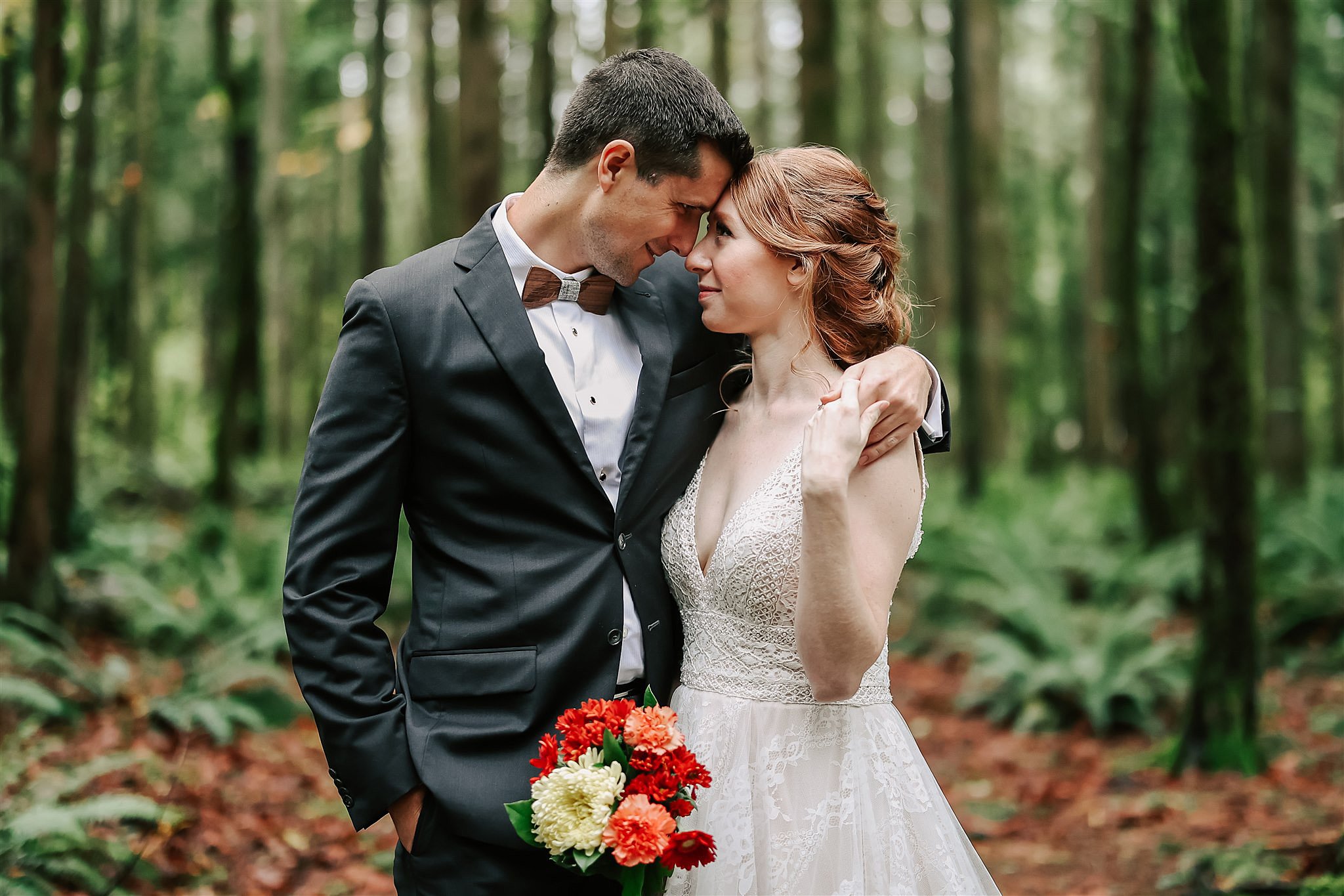 bride and groom touching foreheads during their Vancouver Elopement